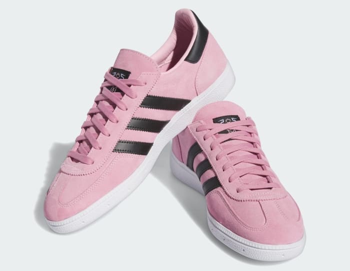 View of Lionel Messi's pink and black adidas sneakers.